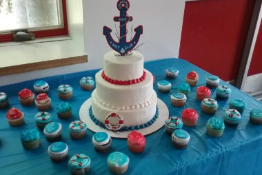 A photo of cakes and cupcakes from the Boat Club banquet